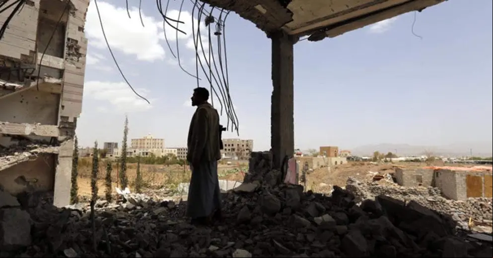 Hashim al-Mutawakel, 27, inspects his family building destroyed by two Saudi-led airstrikes at Nahdah neighborhood in the Yemeni capital Sana’a on 08 January 2016. Hashim said that he was not at home that night, and his family were staying at the basement, so some of them suffered minor injuries. The building suffered two air strikes, destroying it completely.